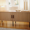 French roll-up doors blend TV cabinet