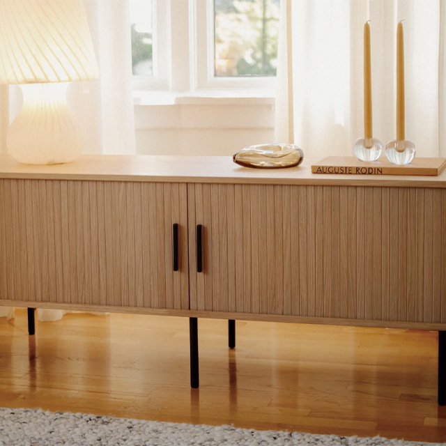 French roll-up doors blend TV cabinet