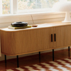 French roll-up doors blend TV cabinet