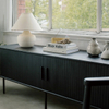 French roll-up doors blend TV cabinet
